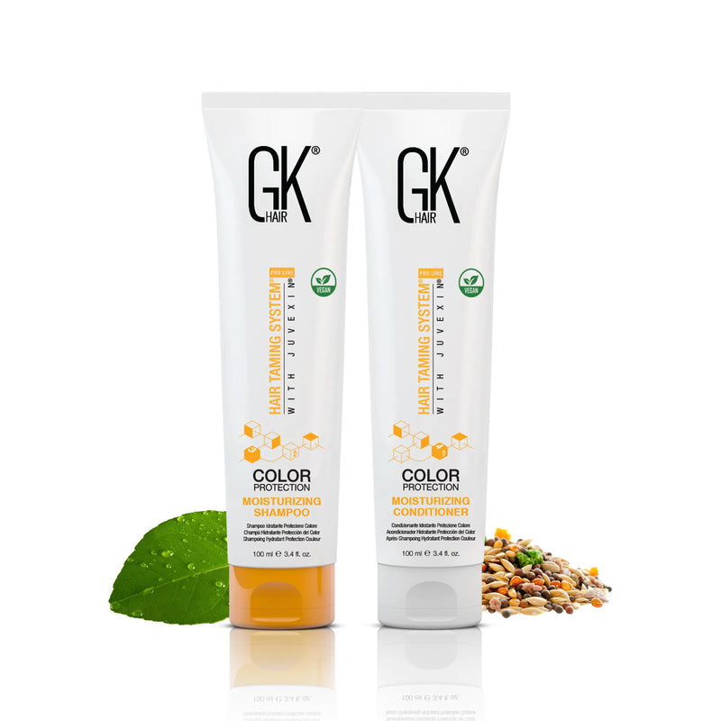 GK Hair Moisturizing Shampoo and Conditioner travel-size 100 ml tubes with a green leaf and mixed seeds
