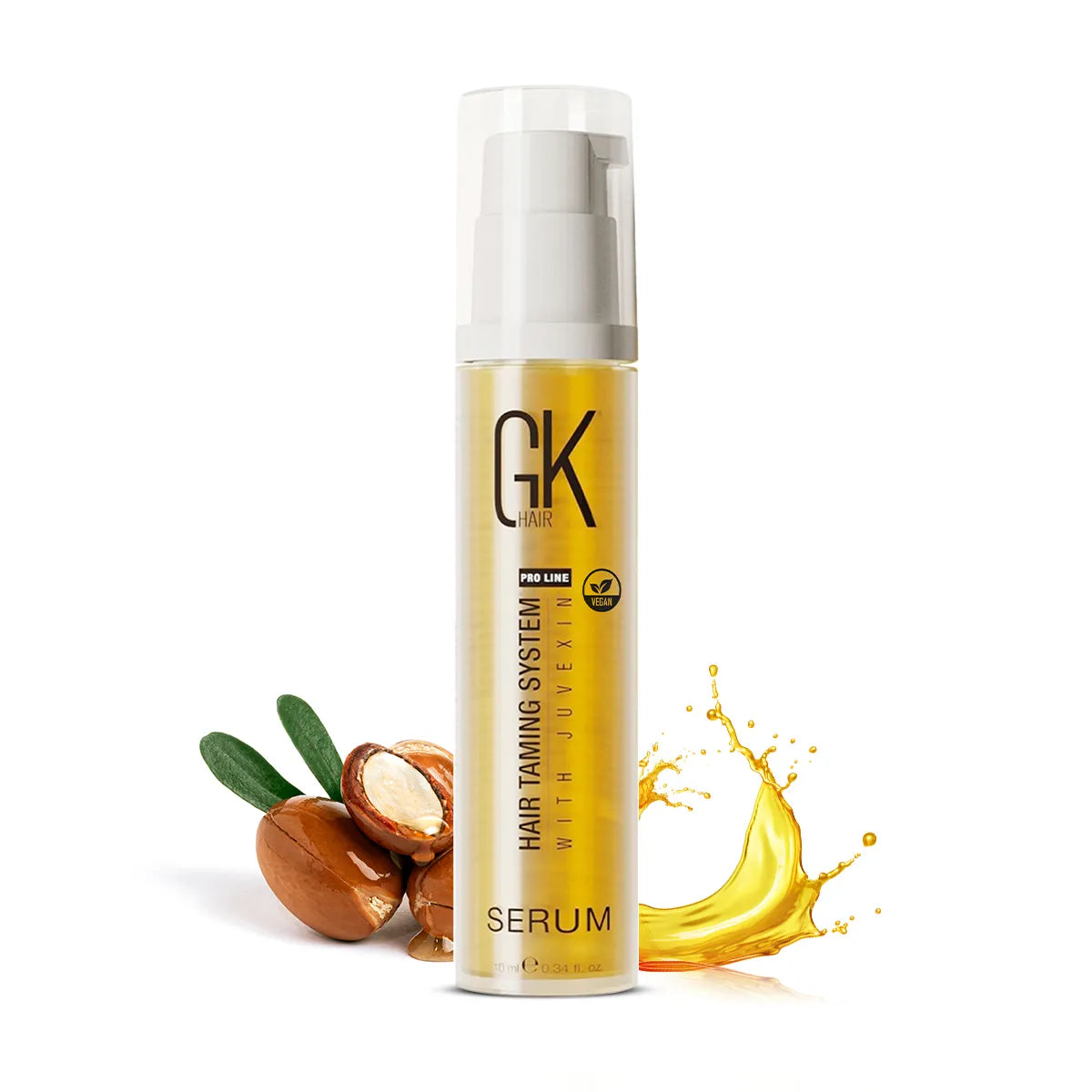 GK Hair Serum Pro 10 ml bottle with white pump cap beside argan nuts and a swirl of golden oil