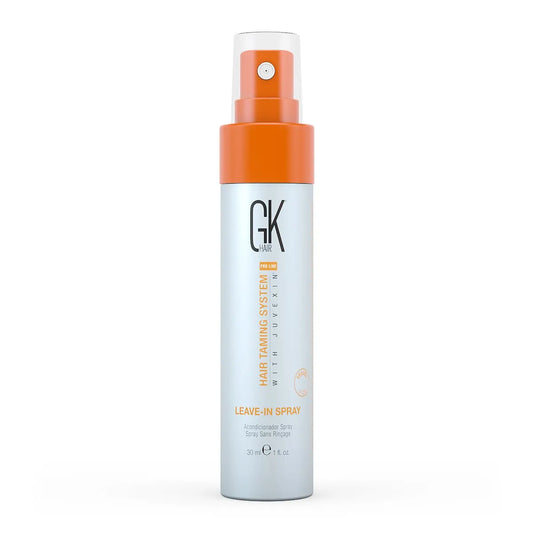 GK Hair Leave-In Spray 30 ml travel-size bottle with orange spray cap, front view on a white background