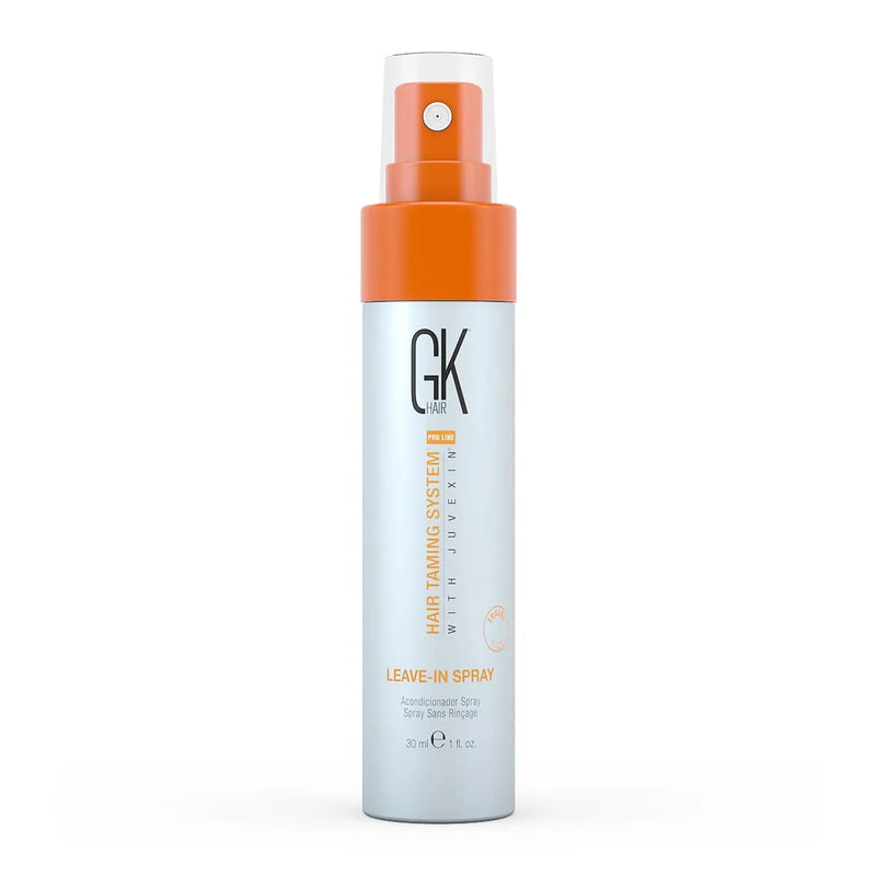 GK Hair Leave-In Spray 30 ml travel-size bottle with orange spray cap, front view on a white background
