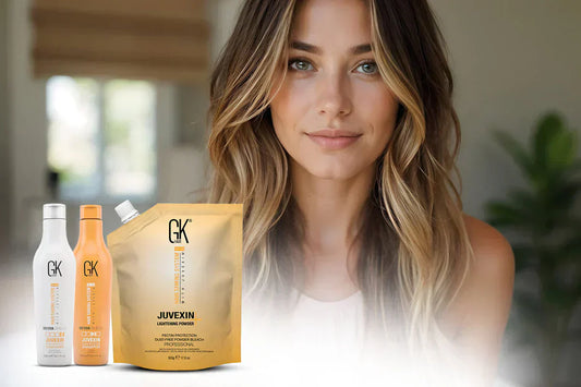 A Smiling Lady With a Beautiful Blonde Hair with GK Hair Product in her front