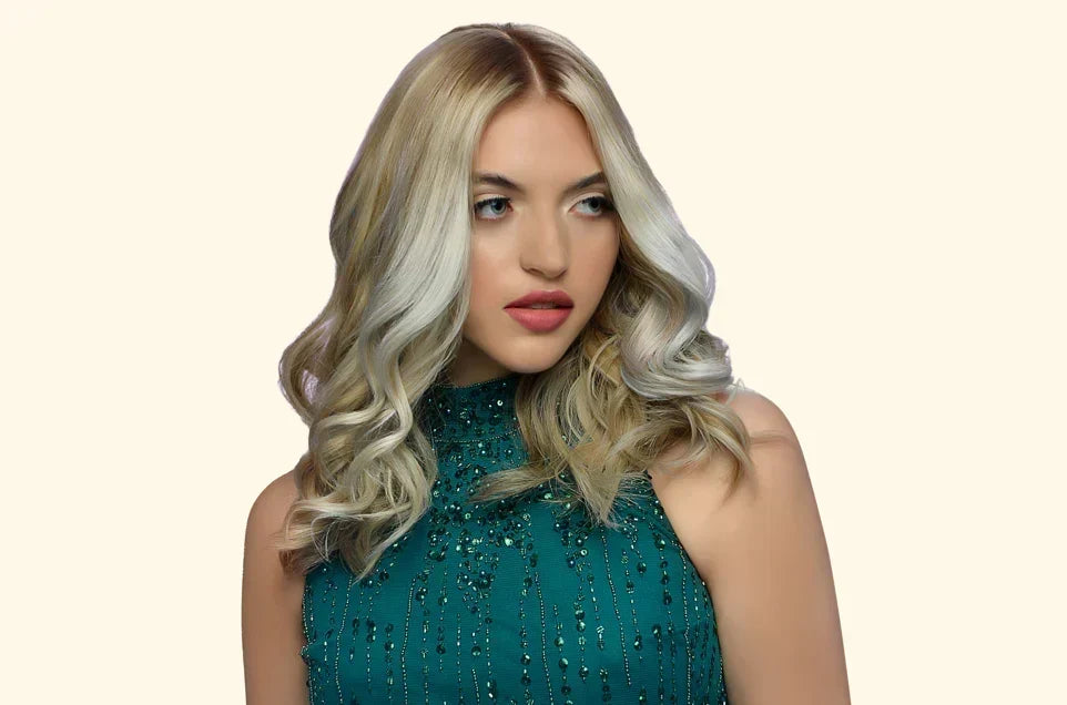 Woman with cool-toned ash blonde hair, illustrating the ash blonde hair color guide