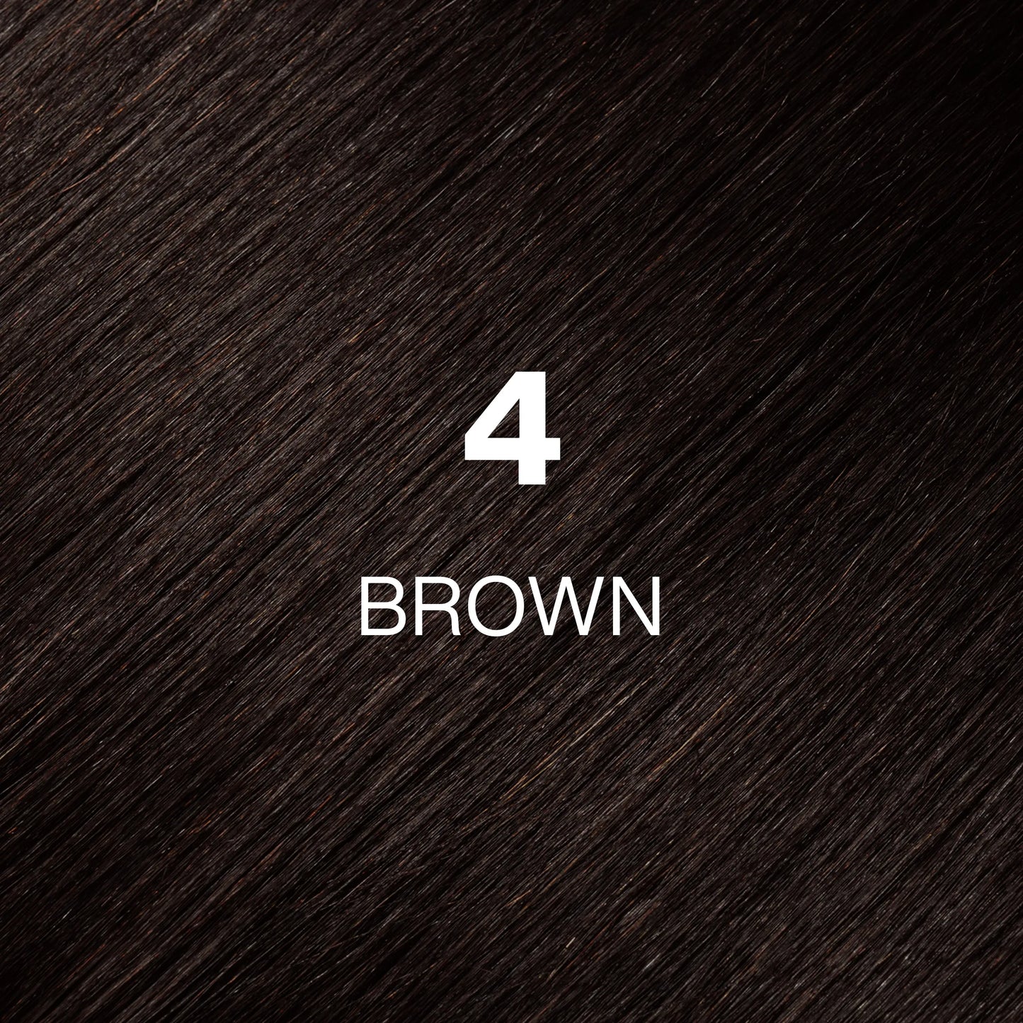 Silky hair texture showcasing the GK Hair's Juxevin Cream Color "4 Brown" in bold white text.