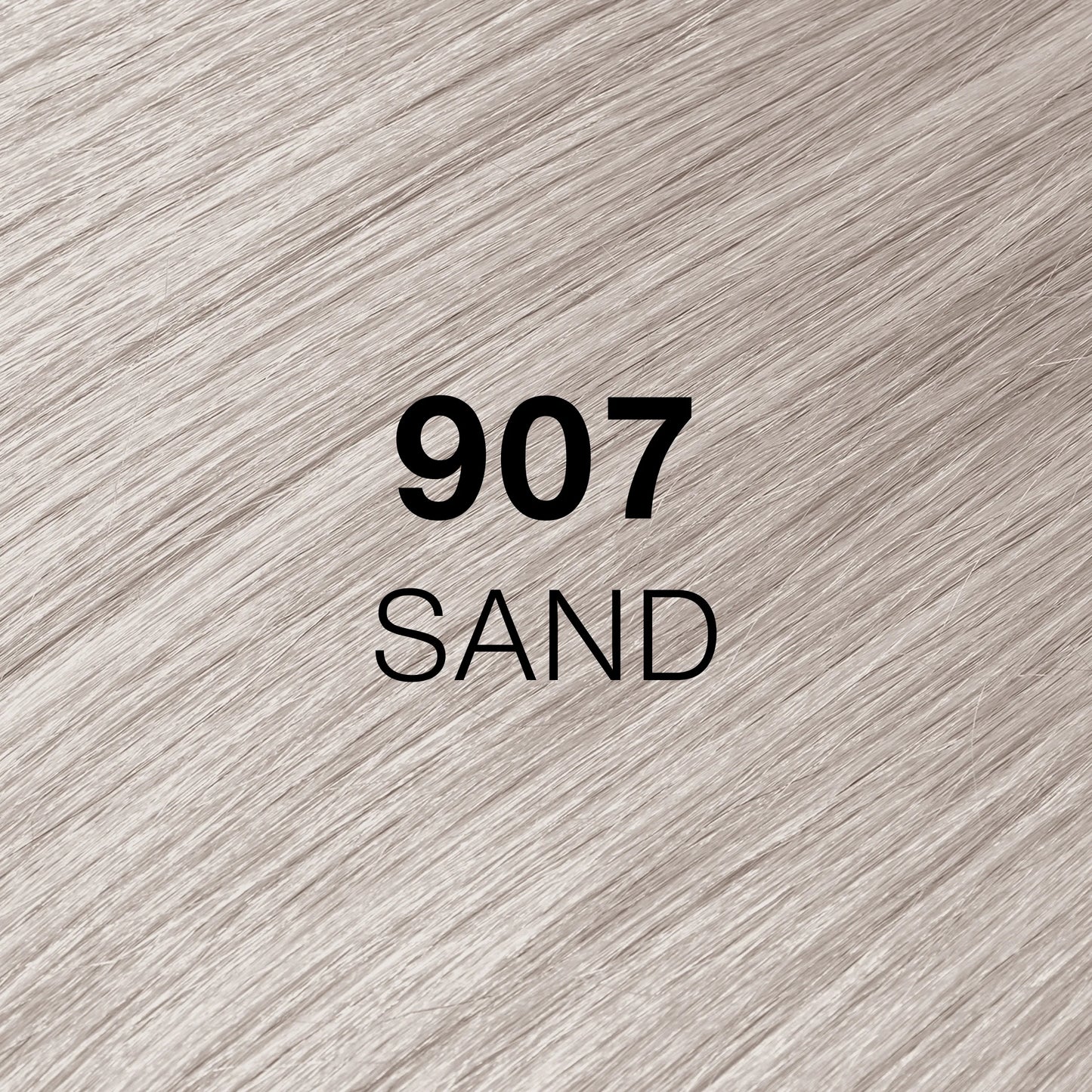 Silky hair texture showcasing the GK Hair's Juxevin Cream Color "907 Sand" in bold white text.