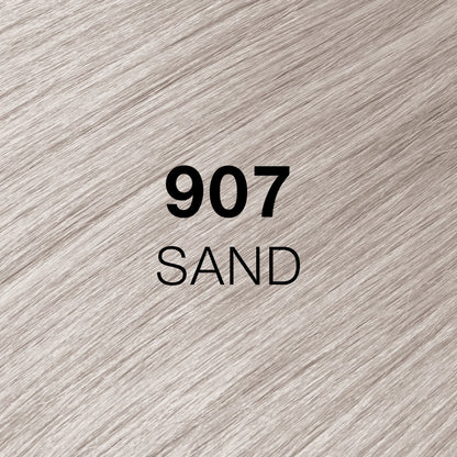 Silky hair texture showcasing the GK Hair's Juxevin Cream Color "907 Sand" in bold white text.