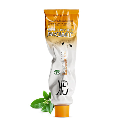 Tube of Juvexin cream color for hair, with a distinctive orange lid, featuring botanical illustrations and labels about hair taming.