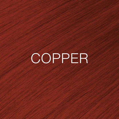 Silky hair texture showcasing the GK Hair's Juxevin Cream Color "Copper Mixtone" in bold white text.