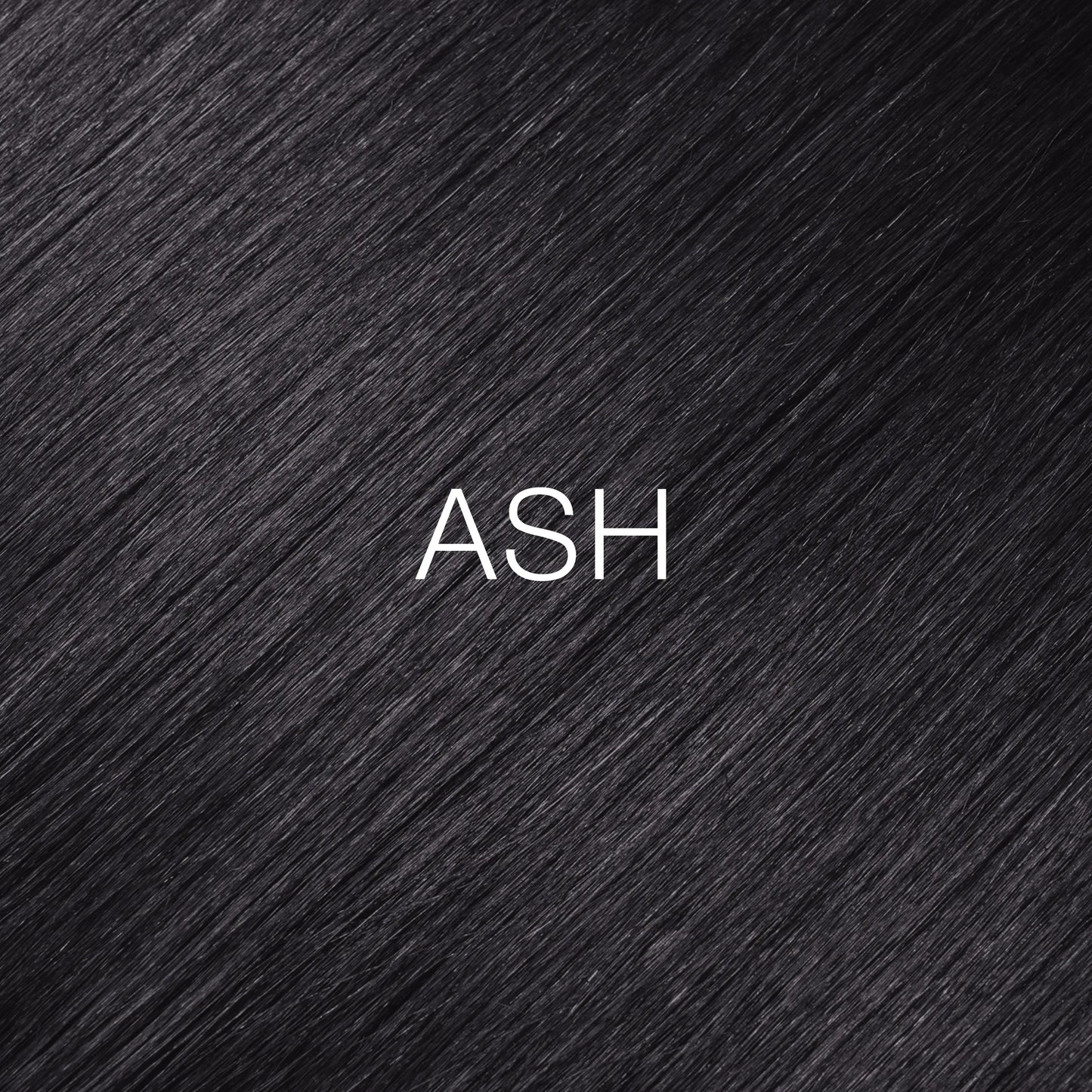 Silky hair texture showcasing the GK Hair's Juxevin Cream Color "Ash Mixtone" in bold white text.