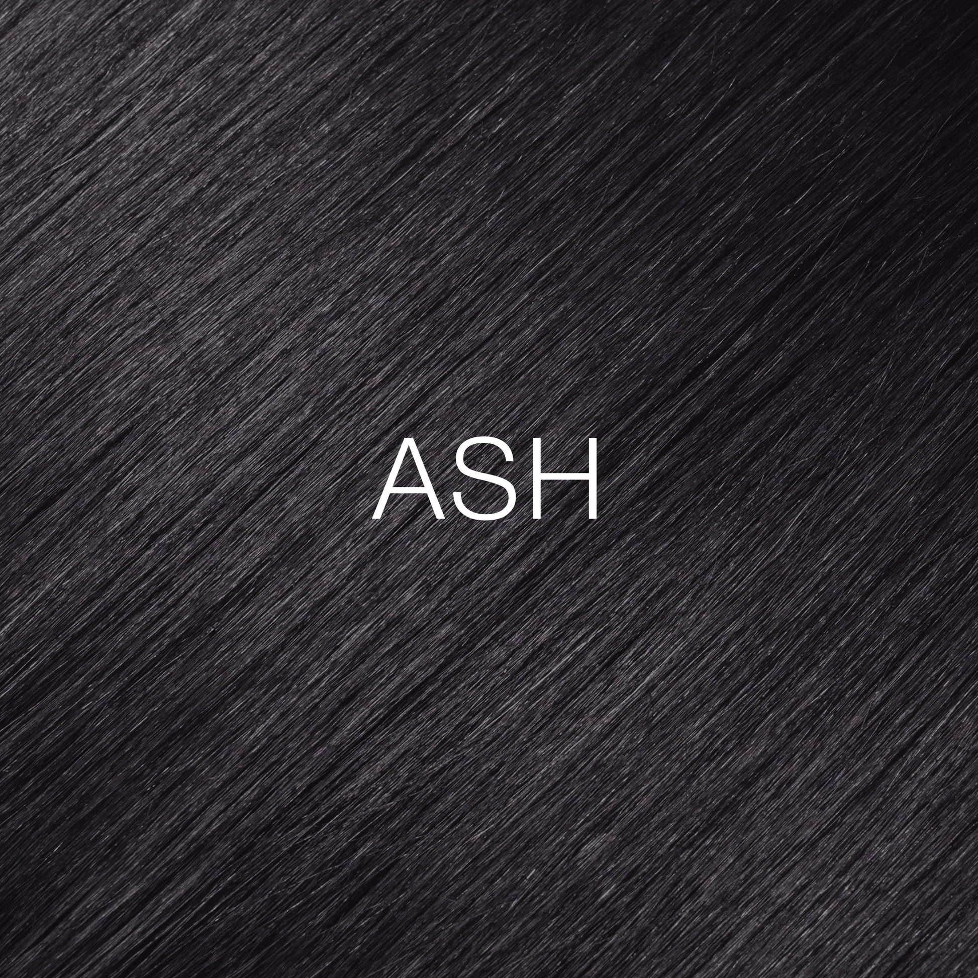 Silky hair texture showcasing the GK Hair's Juxevin Cream Color "Ash Mixtone" in bold white text.