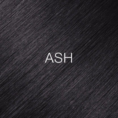Silky hair texture showcasing the GK Hair's Juxevin Cream Color "Ash Mixtone" in bold white text.