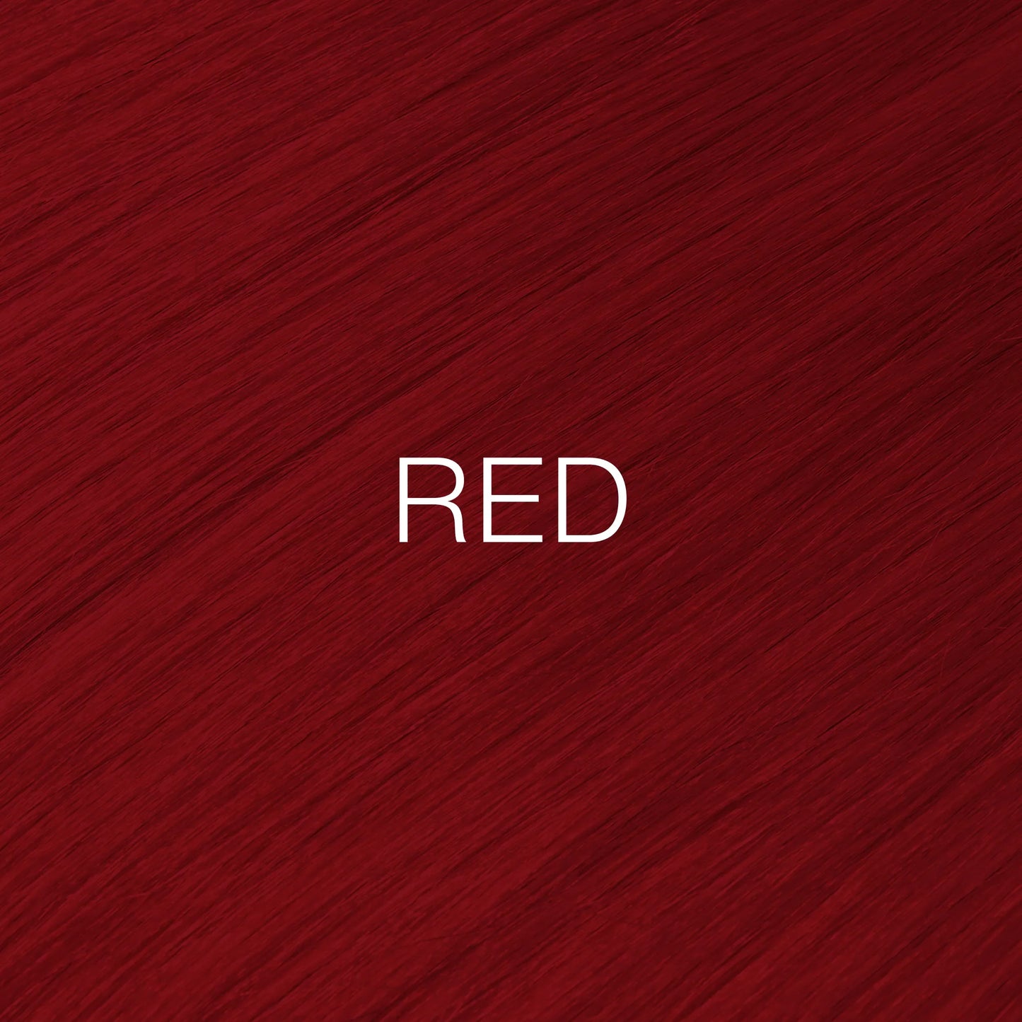 Silky hair texture showcasing the GK Hair's Juxevin Cream Color "Red Mixtone" in bold white text.