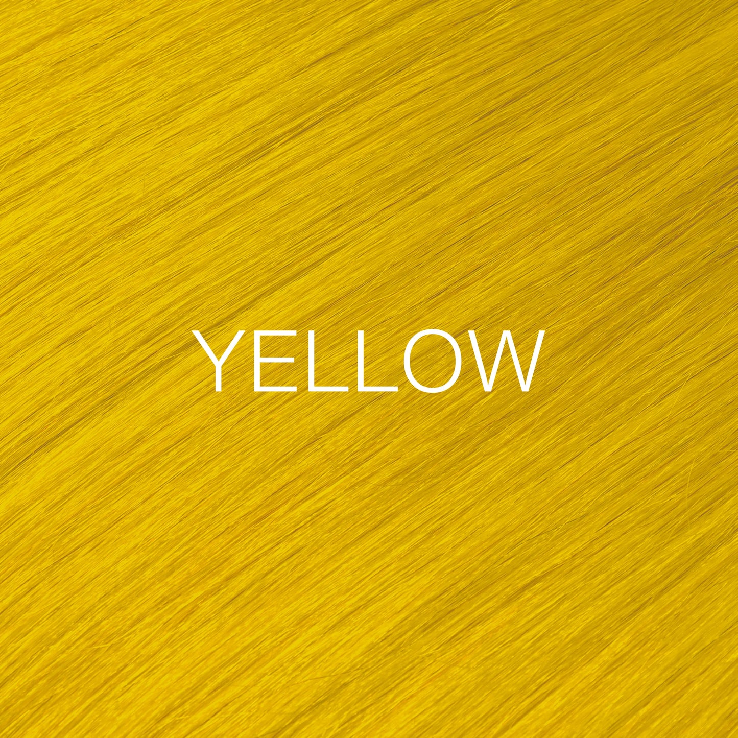 Silky hair texture showcasing the GK Hair's Juxevin Cream Color "Yellow Mixtone" in bold white text.